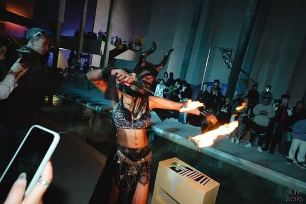A FlowFinch event with performers and audience.